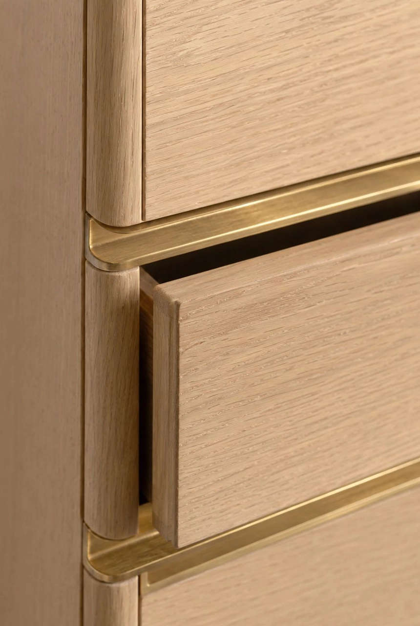 X4 Design and Build luxury wood cabinet detail with brass shadow lines, rounded drawer edge, clean handle profile, and refined joinery craftsmanship